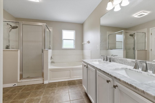 full bathroom with a stall shower, visible vents, and a sink