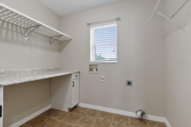 laundry area featuring baseboards, laundry area, washer hookup, and hookup for an electric dryer