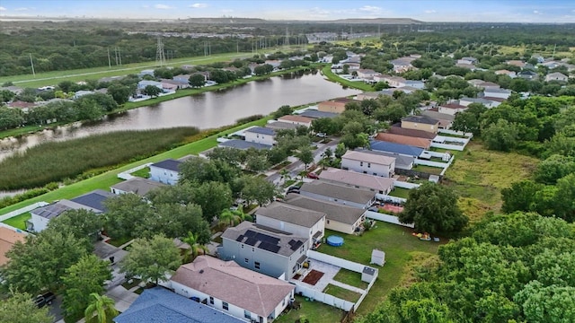 aerial view featuring a residential view and a water view