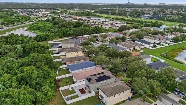 aerial view with a water view and a residential view