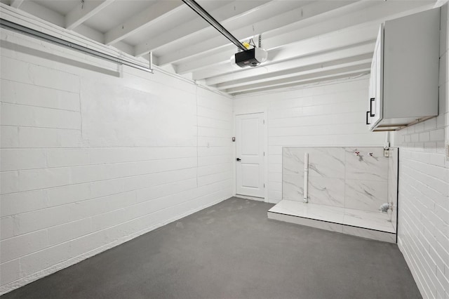 garage featuring a garage door opener