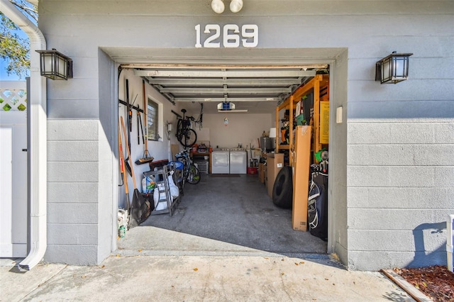 garage with washer and dryer