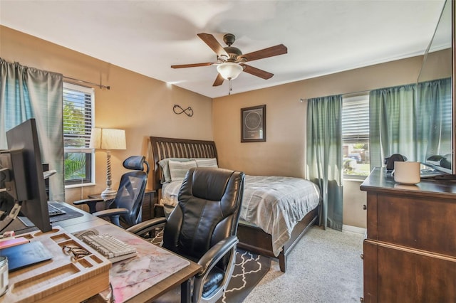 bedroom featuring a ceiling fan and baseboards