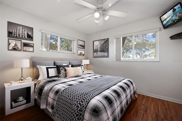 1549 San Christopher Dr, Dunedin, FL 34698 - bedroom with ceiling fan, wood finished floors, and baseboards