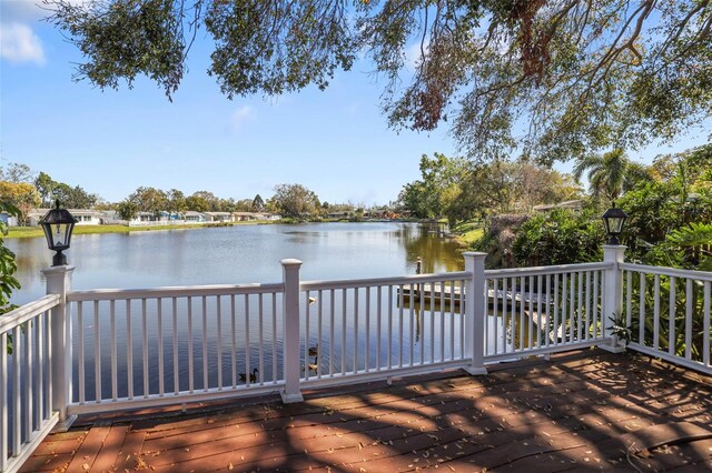 1549 San Christopher Dr, Dunedin, FL 34698 - wooden deck with a water view