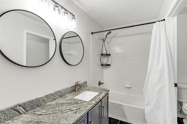 bathroom featuring vanity, toilet, and shower / bath combo with shower curtain