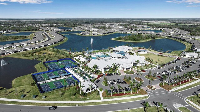 birds eye view of property featuring a residential view and a water view