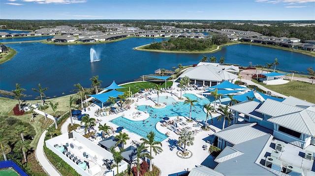 aerial view featuring a residential view and a water view