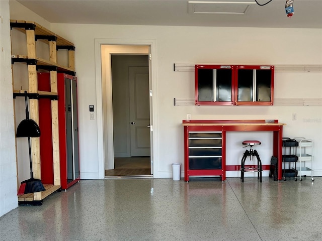 garage with baseboards