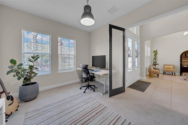 office featuring french doors, carpet flooring, plenty of natural light, and baseboards