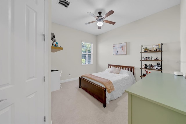 bedroom featuring visible vents, ceiling fan, light carpet, and baseboards