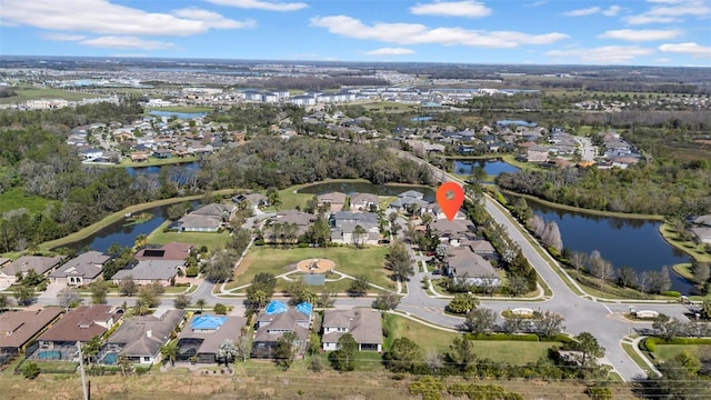 aerial view with a water view and a residential view