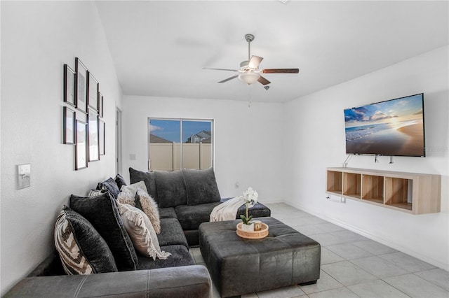 living area with a ceiling fan