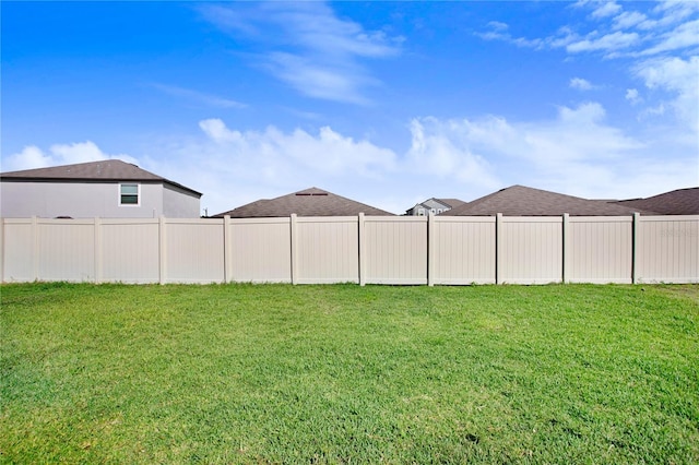 view of yard with fence