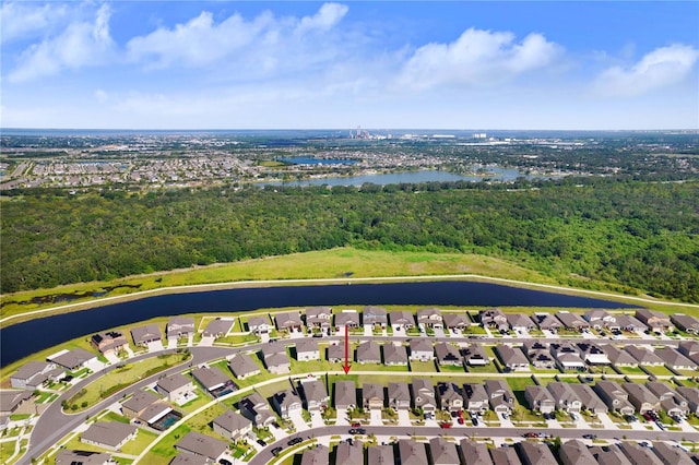 drone / aerial view featuring a water view and a residential view