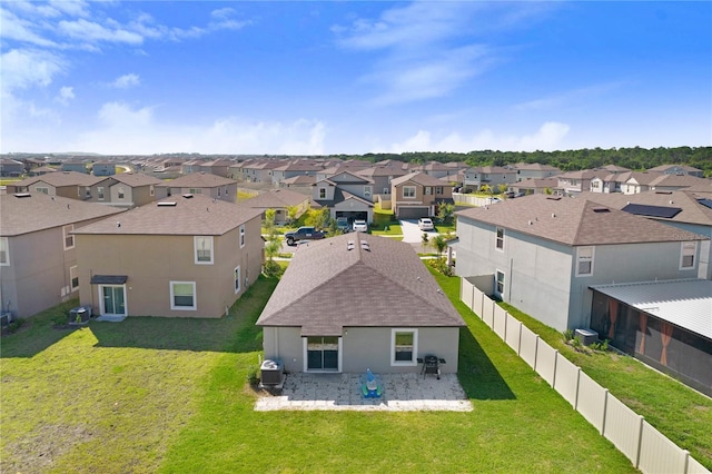 drone / aerial view with a residential view