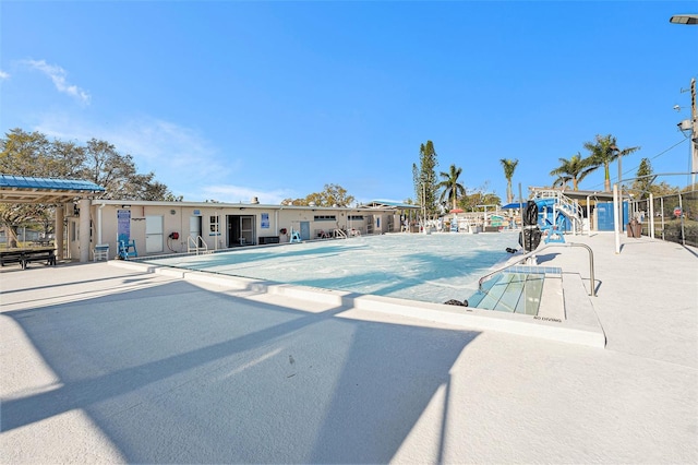 pool with a patio