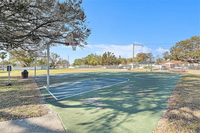 view of sport court with community basketball court and fence