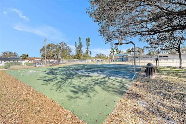 view of sport court featuring community basketball court and fence