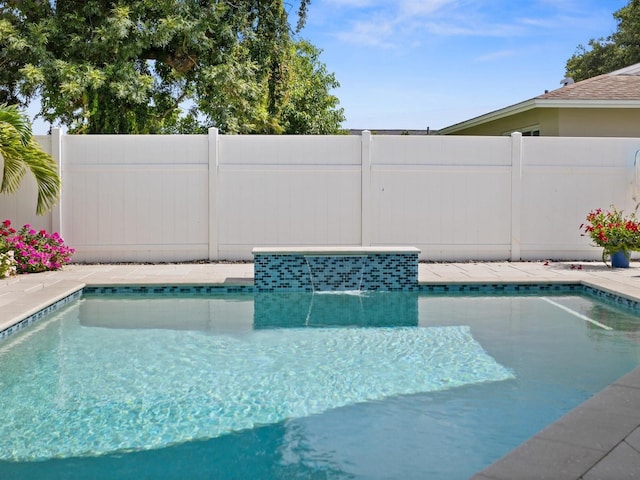 view of swimming pool with fence and a fenced in pool