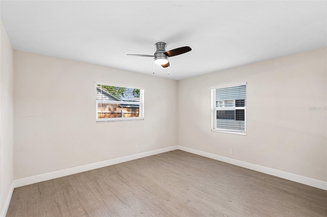 810 22nd St N, Saint Petersburg, FL 33713 - spare room featuring a ceiling fan, baseboards, and wood finished floors