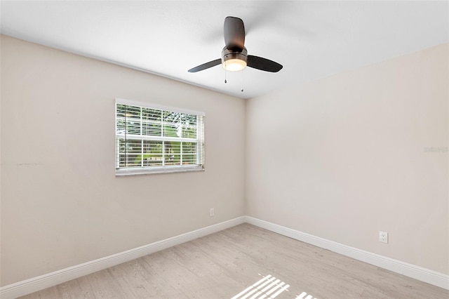 810 22nd St N, Saint Petersburg, FL 33713 - empty room with wood finished floors, a ceiling fan, and baseboards
