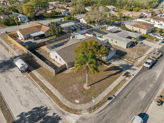 birds eye view of property with a residential view