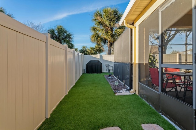 view of yard featuring a fenced backyard
