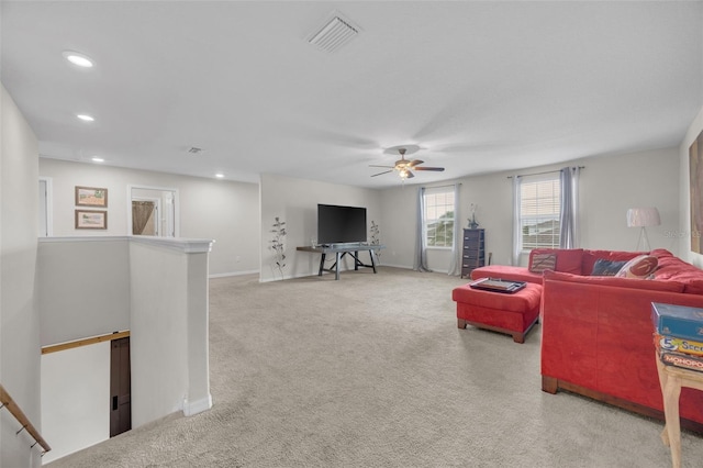 living area with baseboards, carpet, visible vents, and recessed lighting