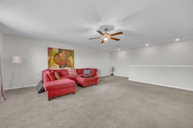 living area with ceiling fan, baseboards, carpet flooring, and recessed lighting