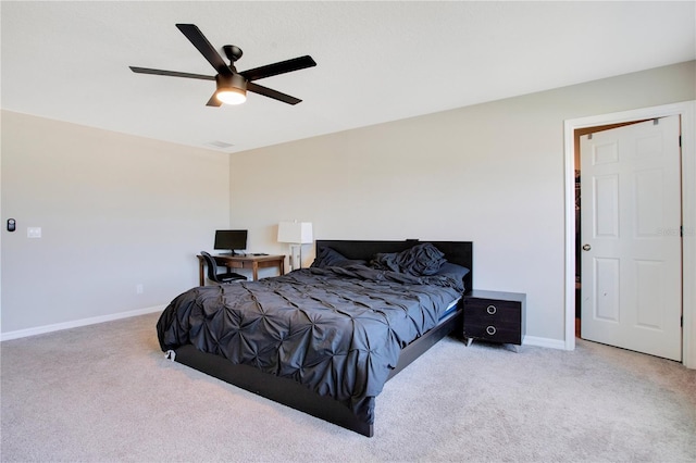 bedroom with baseboards, carpet floors, and a ceiling fan