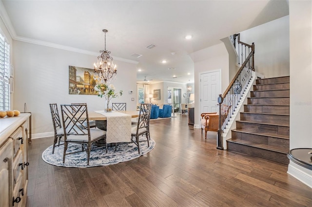 dining area featuring stairway, dark wood-style floors, baseboards, crown molding, and a chandelier