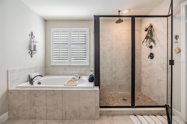 bathroom with a garden tub and a stall shower