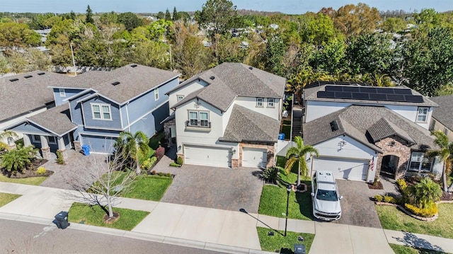 birds eye view of property with a residential view