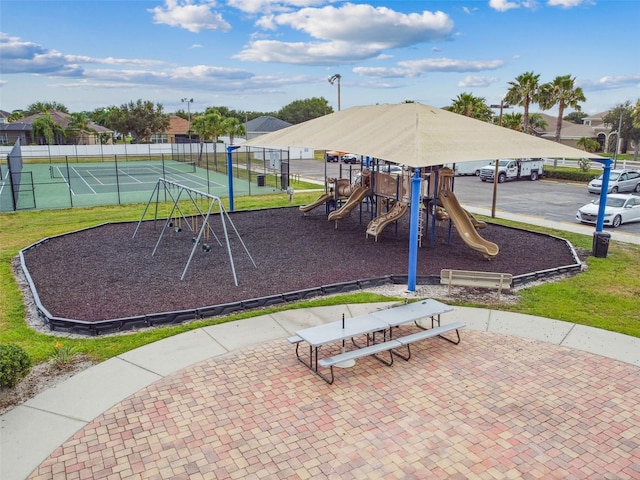 community jungle gym with fence