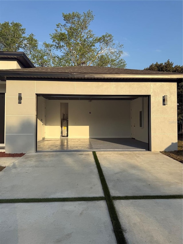 garage featuring driveway