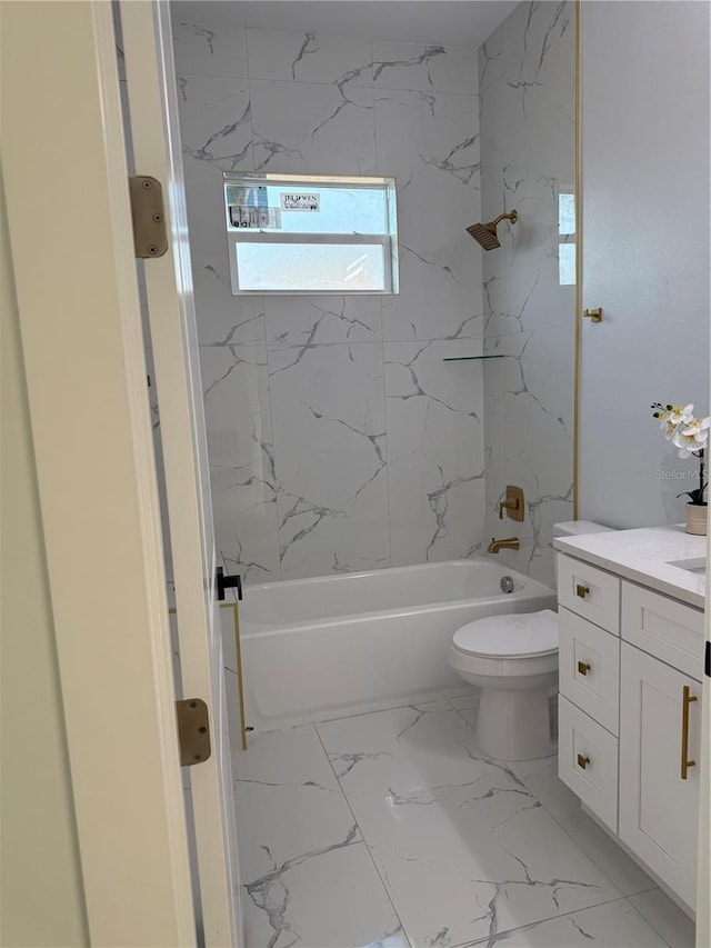 bathroom with vanity, toilet, tub / shower combination, and marble finish floor