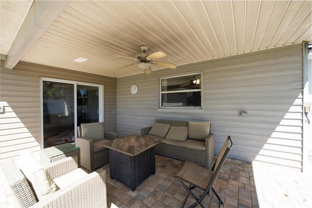 view of patio with ceiling fan and an outdoor hangout area