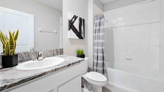 bathroom with shower / bath combination with curtain, vanity, and toilet