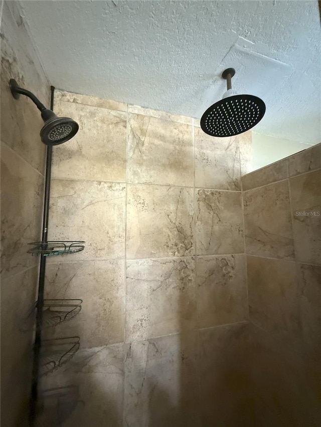 details featuring a tile shower