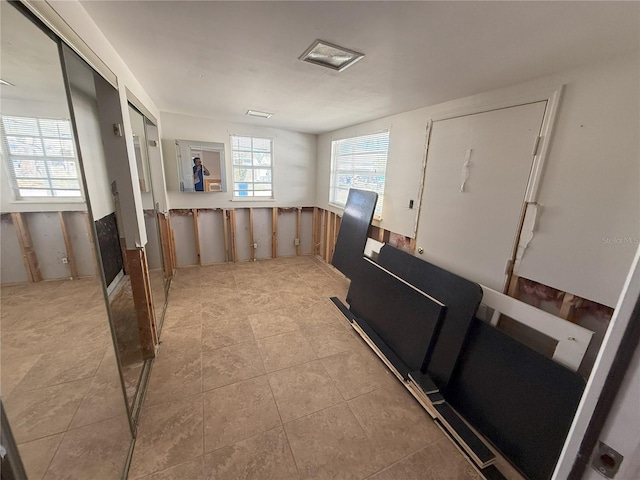 interior space with light tile patterned floors