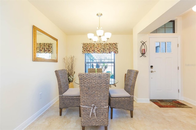dining room with baseboards, light tile patterned floors, and a notable chandelier