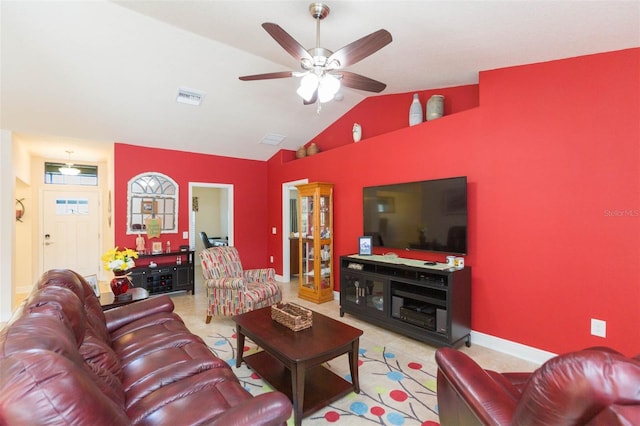 living room featuring a ceiling fan, visible vents, vaulted ceiling, and baseboards