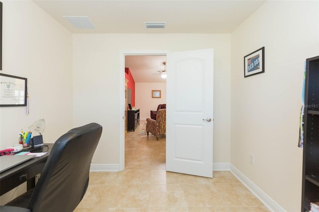 office space featuring visible vents, baseboards, and light tile patterned flooring