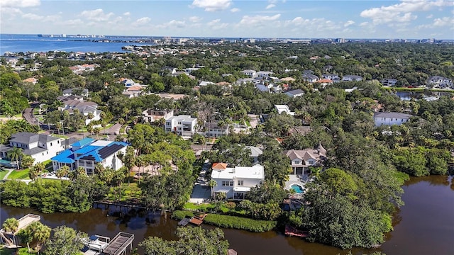 bird's eye view with a residential view and a water view