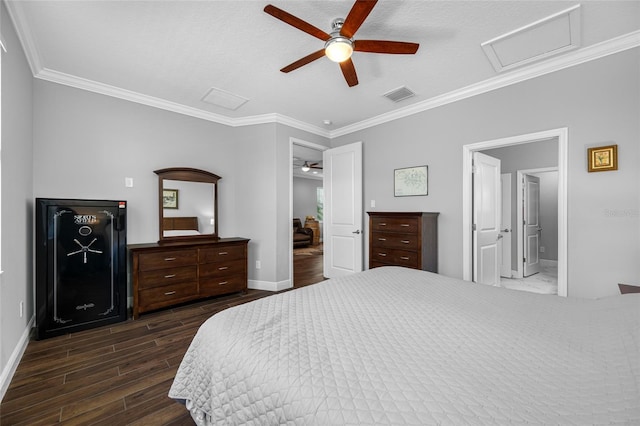 bedroom with dark wood-style floors, visible vents, attic access, and baseboards