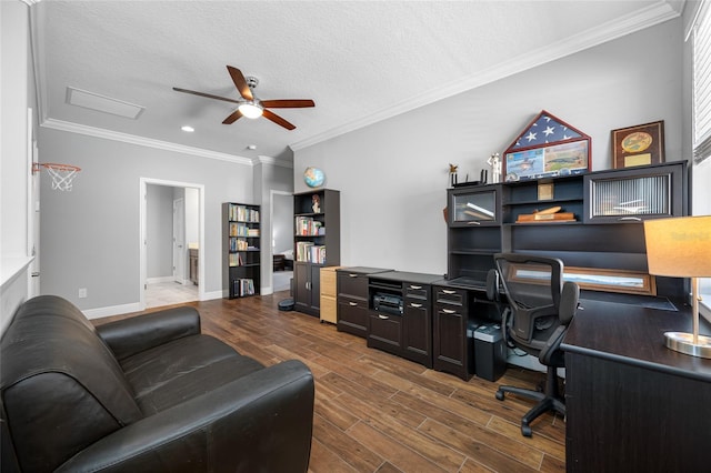 office with baseboards, a textured ceiling, dark wood-style flooring, and crown molding