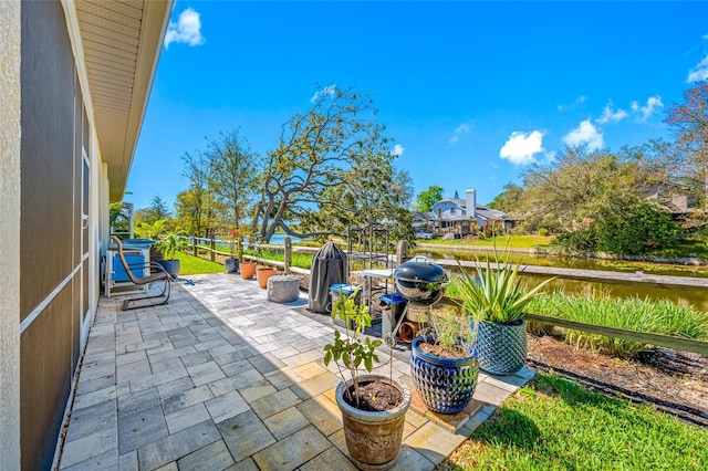 view of patio featuring fence