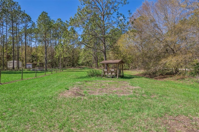 view of yard with fence