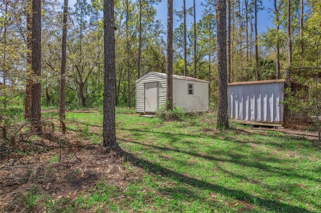 view of yard with a storage unit and an outdoor structure